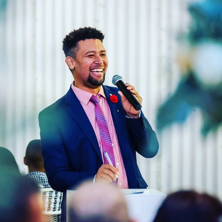 Chester Meyer as MC at an event