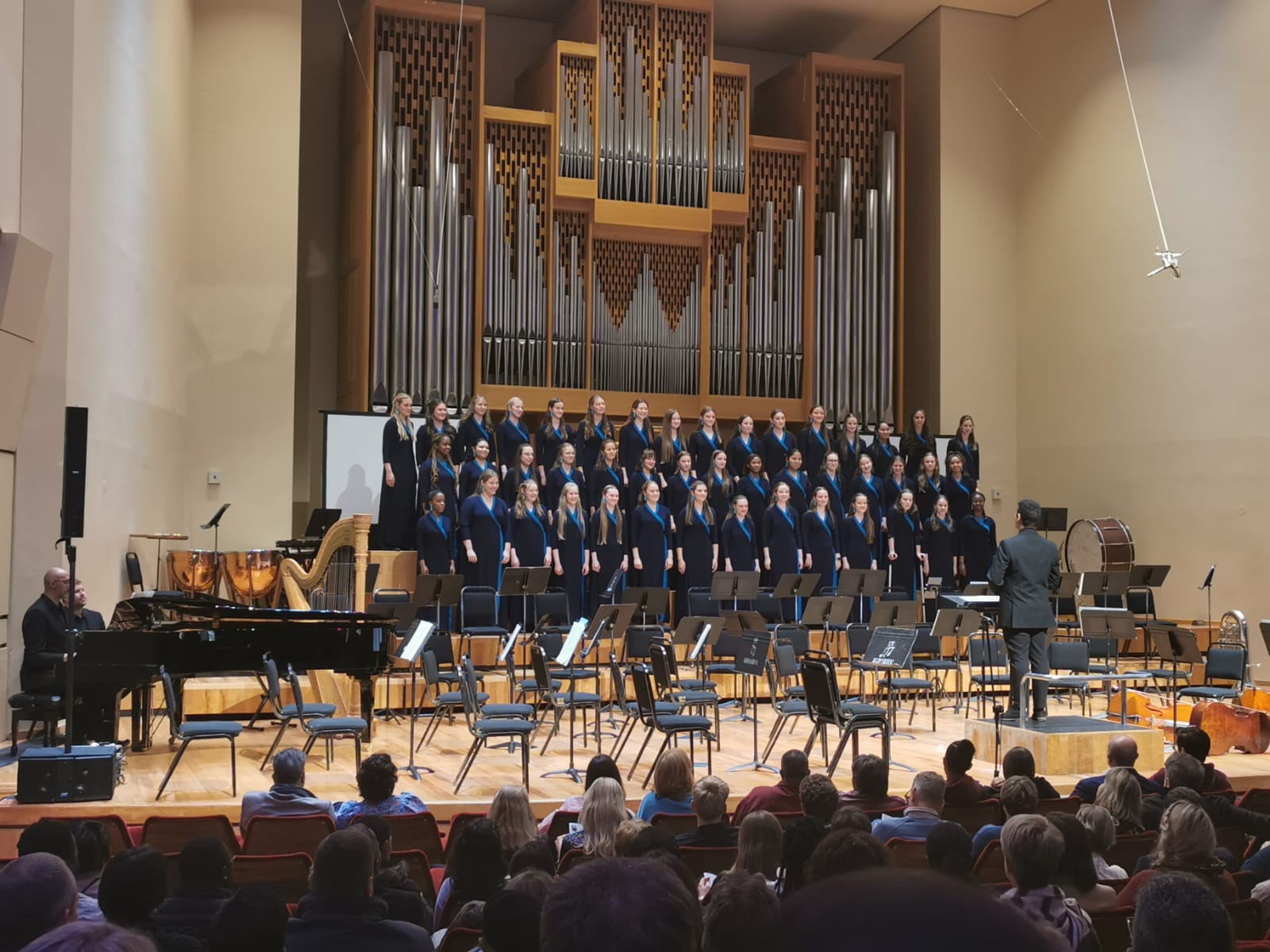 Chester Meyer choir conductor leading ensemble